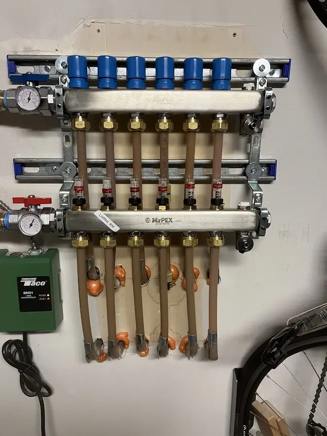 Plumber performing Water Heater Repair at a residential property in Haddonfield